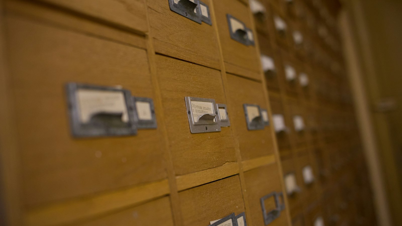 Wooden card catalogue drawers with labels, a metaphor for a hospital CRM data model