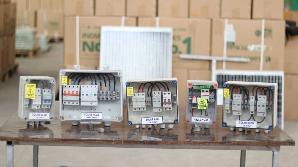 Rows of switches and dials on an industrial control panel