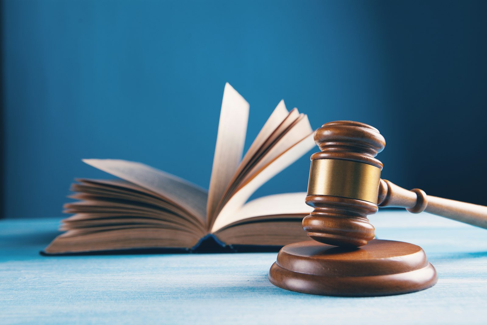 Law books and a gavel on a desk