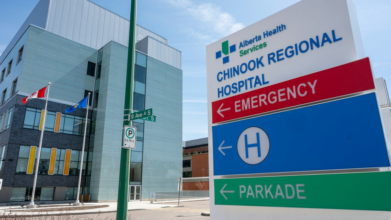 A hospital sign in front of a building