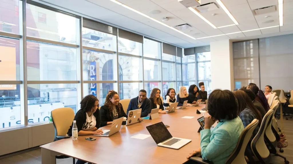 Leadership team reviewing growth plans around a boardroom table