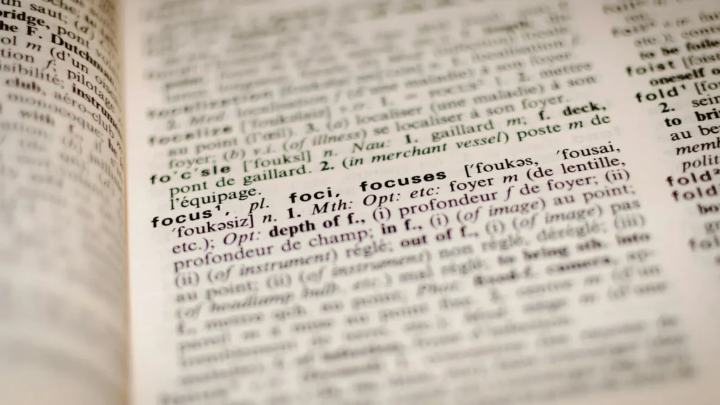 An open dictionary page showing closely printed columns of word entries