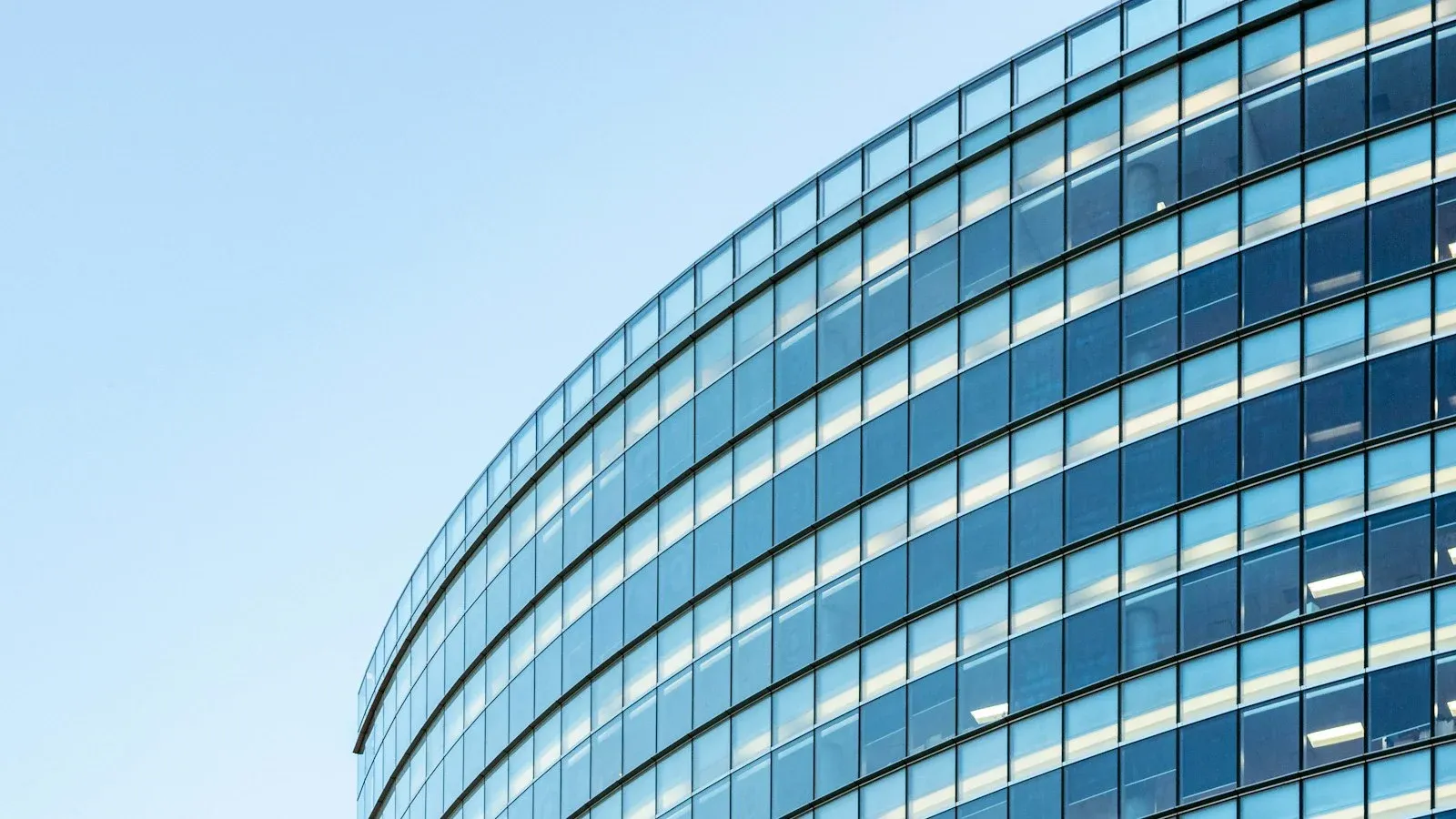 White and blue glass-walled building